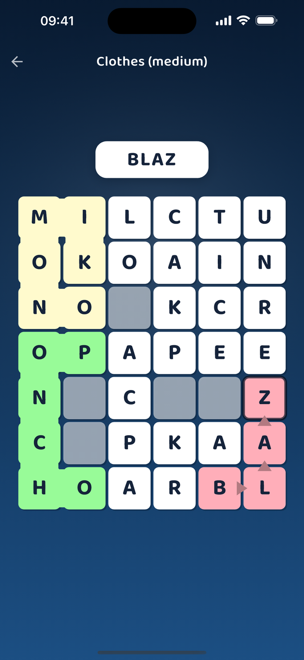 A board being solved: coloured words already found, each bending around its own corners, another being connected.